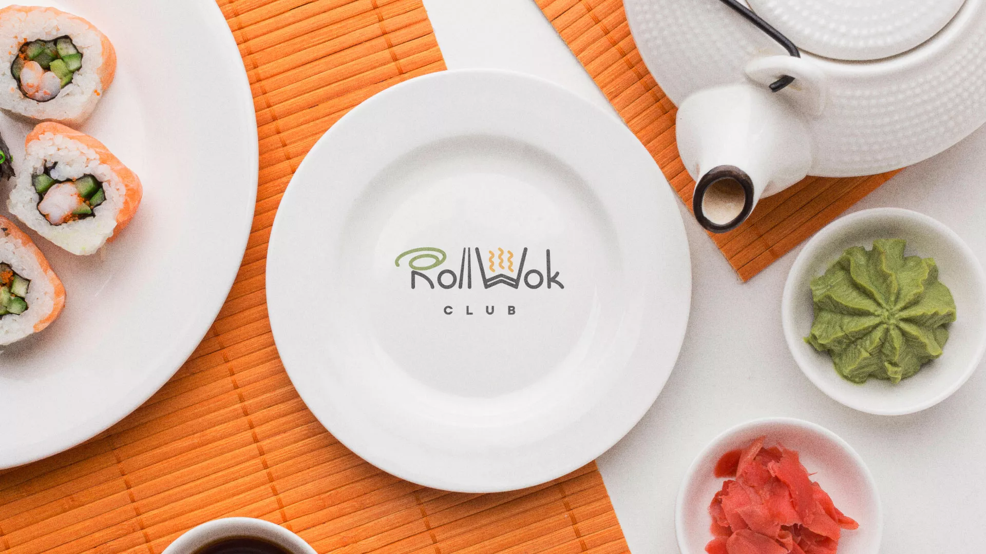 Разработка логотипа и фирменного стиля в Снежинске для суши-бара «Roll Wok Club» Разработка логотипа и фирменного стиля в Снежинске для суши-бара «Roll Wok Club»